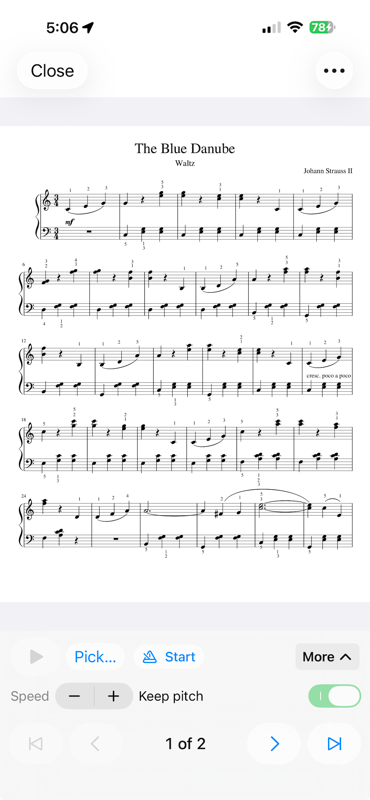 SheetStand playing a piano score on iPhone with speed and page controls